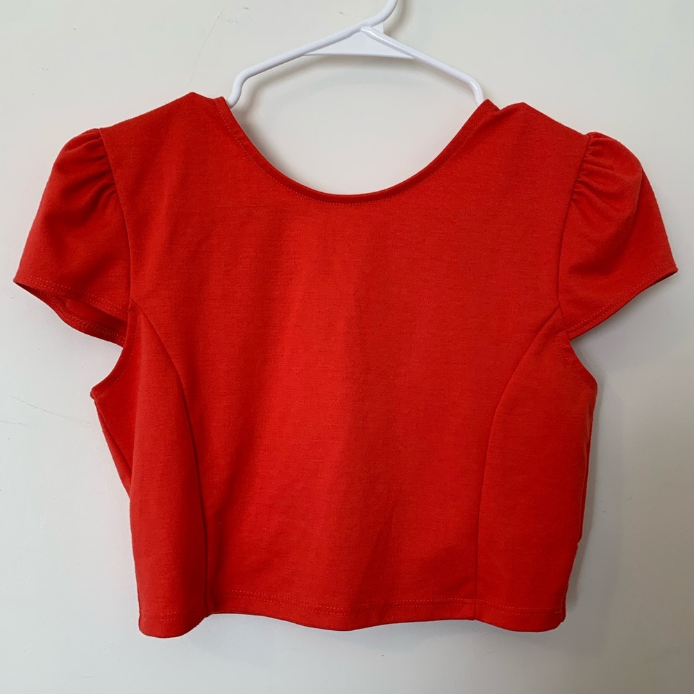 Foreign Exchange Crop Top in red